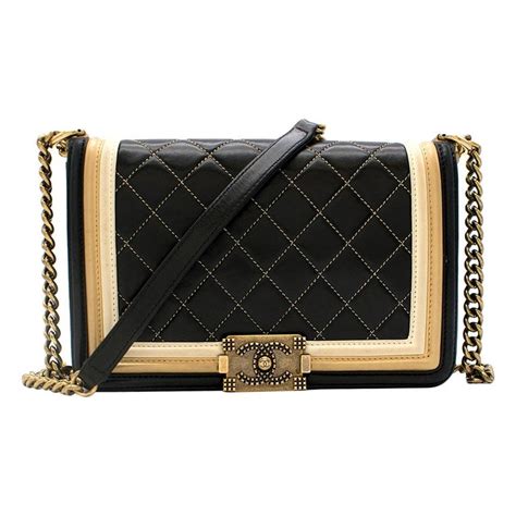 chanel black and gold boy bag|New this season .